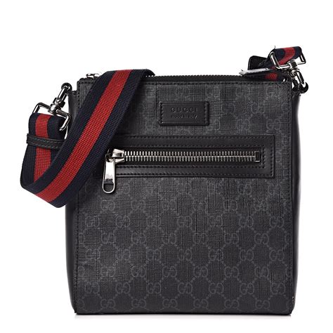 gucci gg black messenger bag.